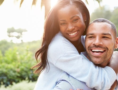 African American couple smiling